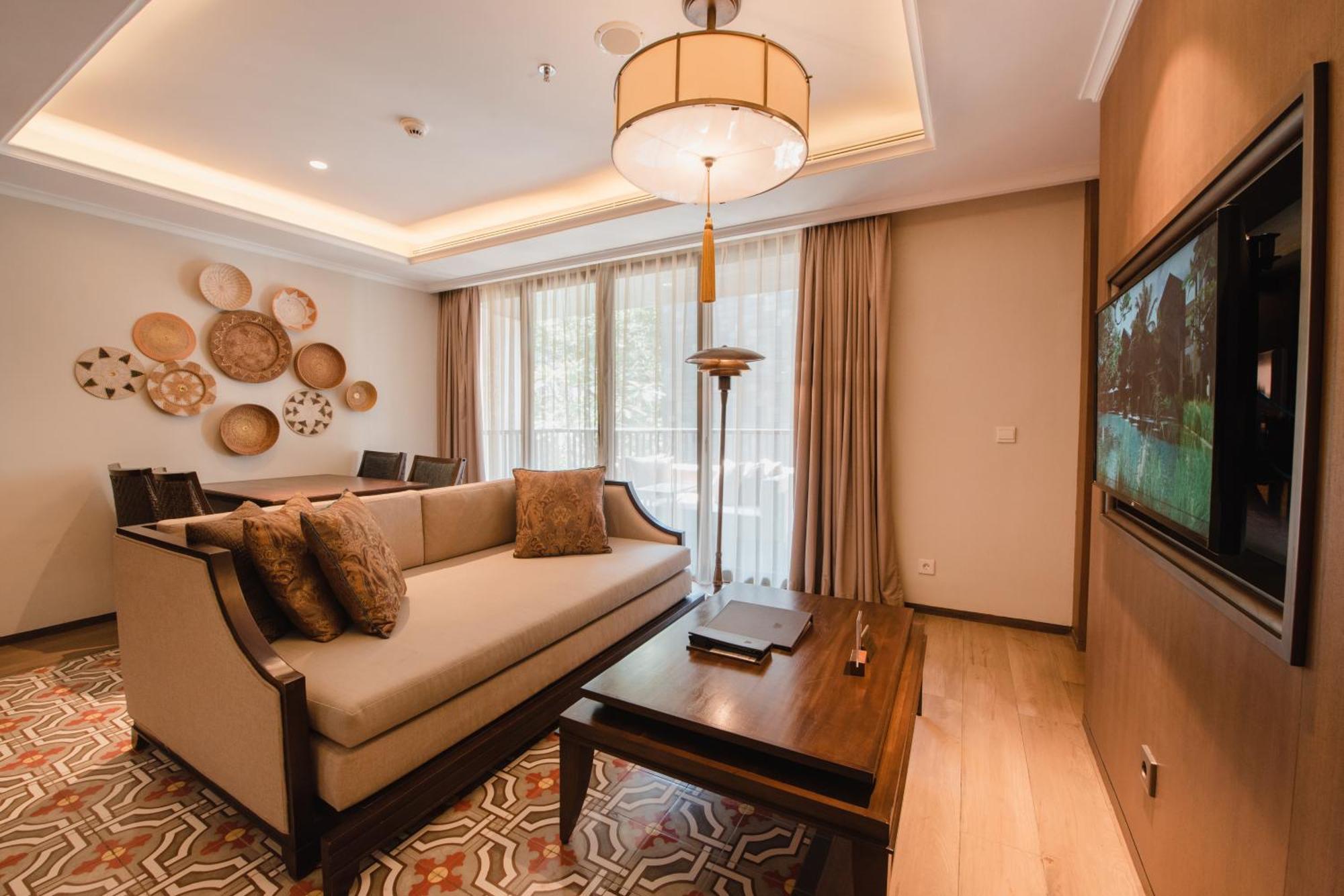 Ramayana Suites And Resort Кута Экстерьер фото Living room of a suite