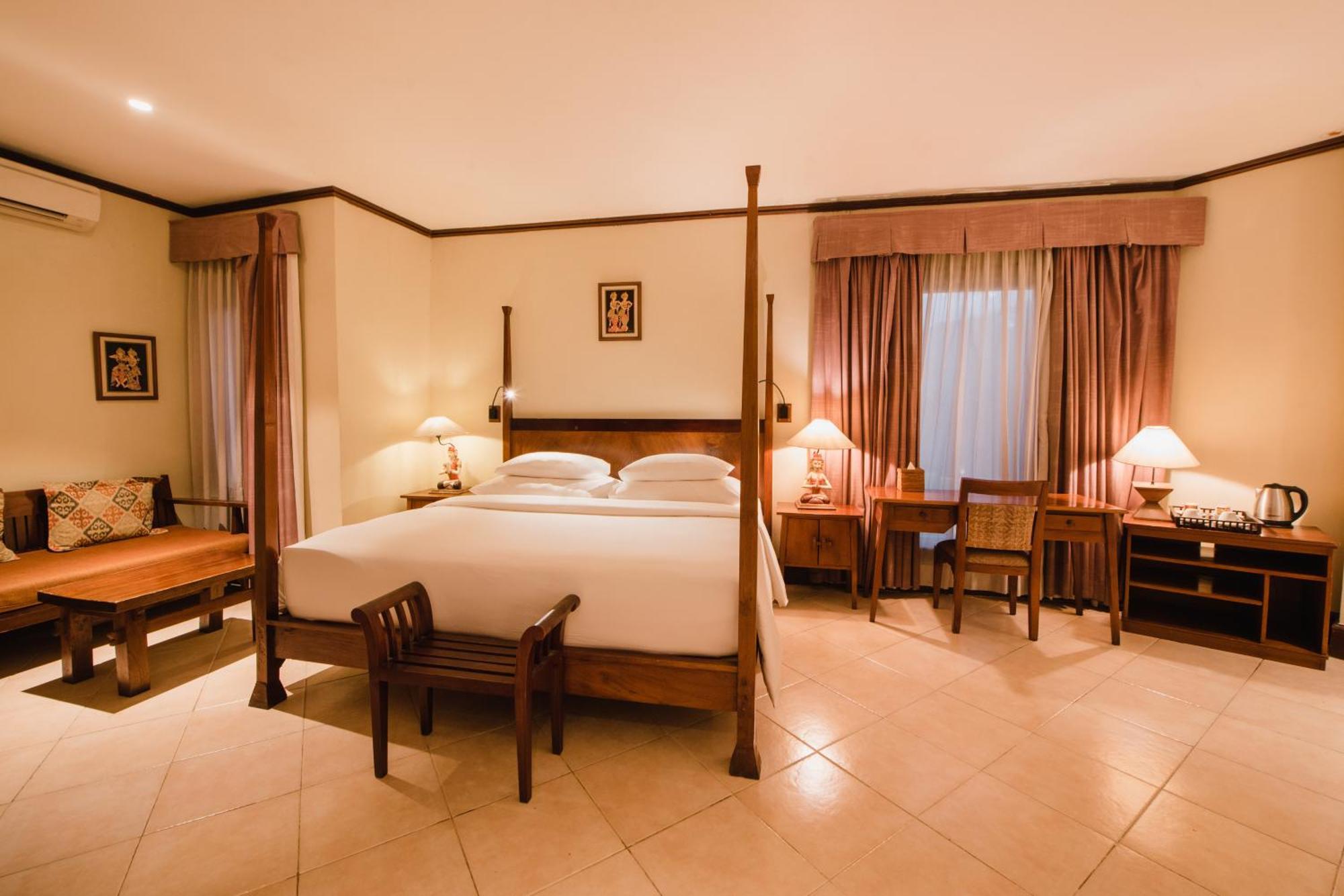 Ramayana Suites And Resort Кута Экстерьер фото A room at the hotel